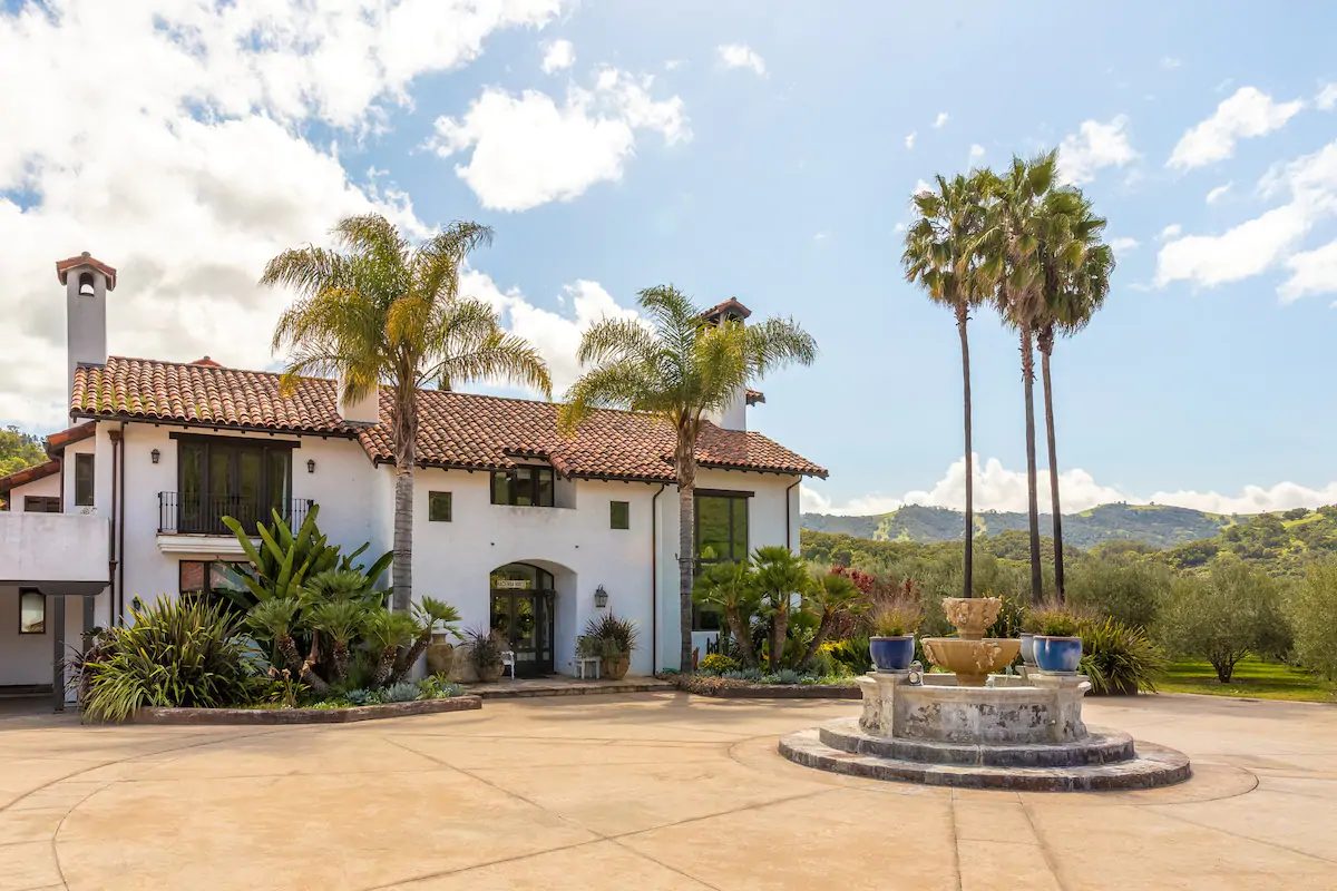 The private estate entrance and fountain